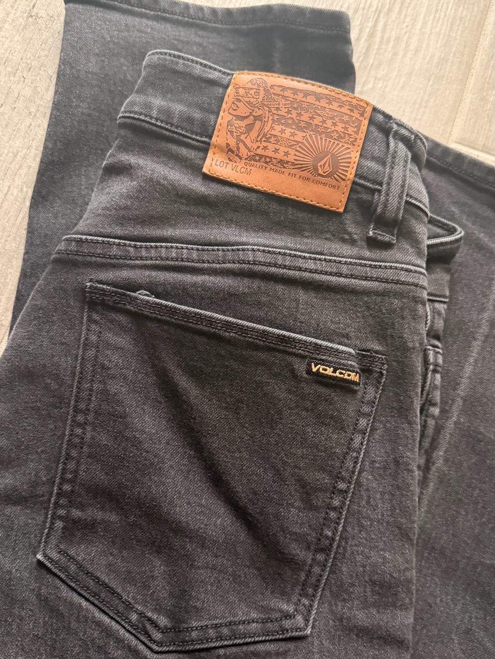 Volcom Slim Straight Black Jeans with Tan Leather Patch